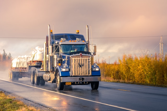 Intermodal shipping container transport vehicle